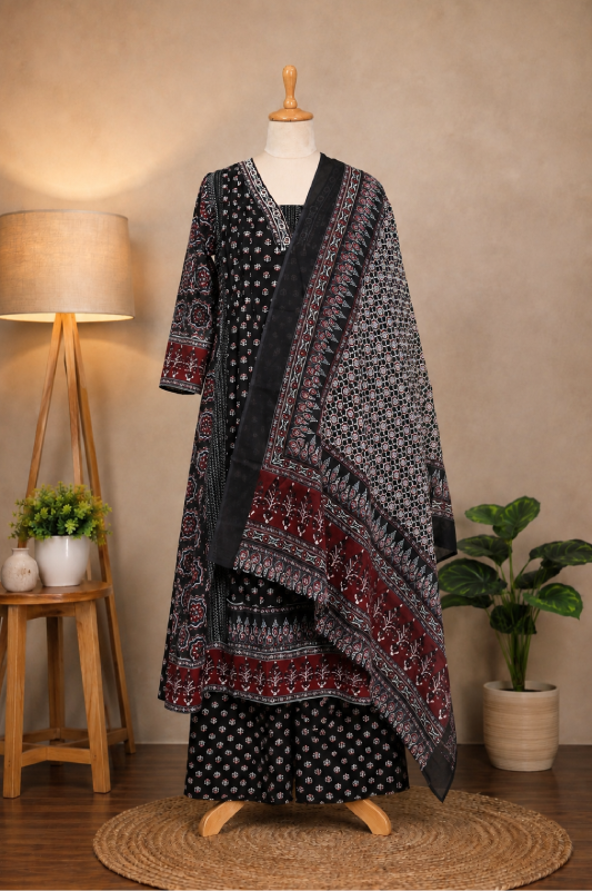 Shop an Ajrakh printed kurta set for women at Subi Trends, featuring a black and maroon Anarkali kurta, matching bottom and printed dupatta for elegant ethnic occasions.