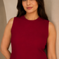 Maroon solid A-line sleeveless kurta paired with matching palazzo