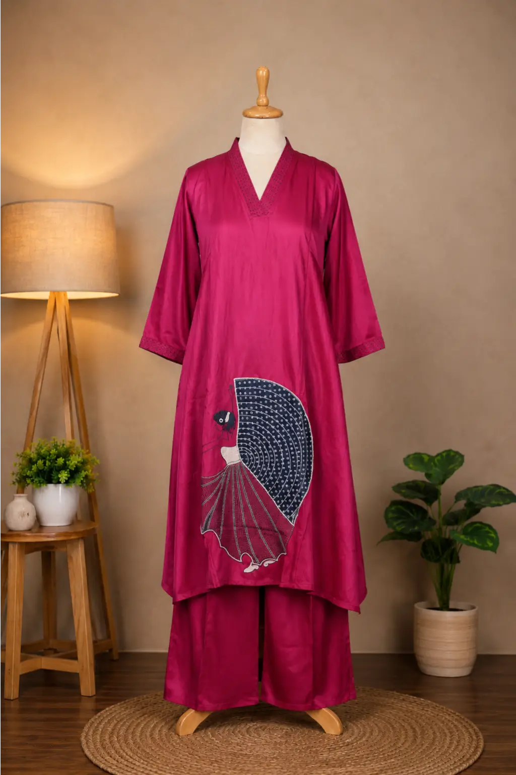 Shop the magenta silk kurta and palazzo set by Subi Trends, crafted in premium Gaji Silk with a stylish A-line kurta, wide-leg palazzo and artistic navy blue detailing.